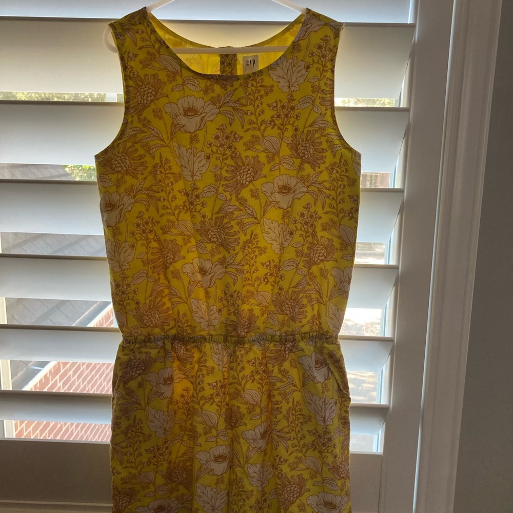 Girls size L, 8-10 girls romper. Yellow with flower design.